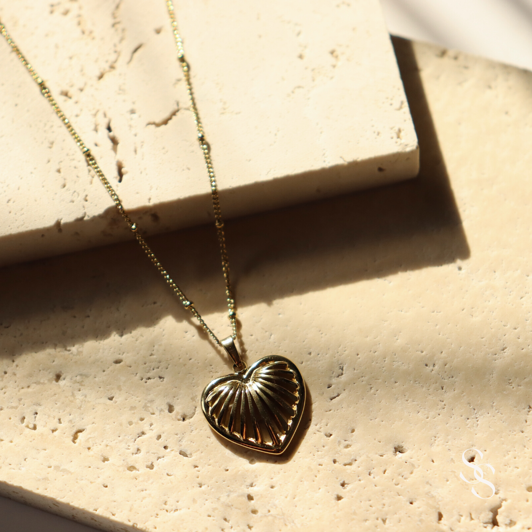 Golden Heart Cage Necklace