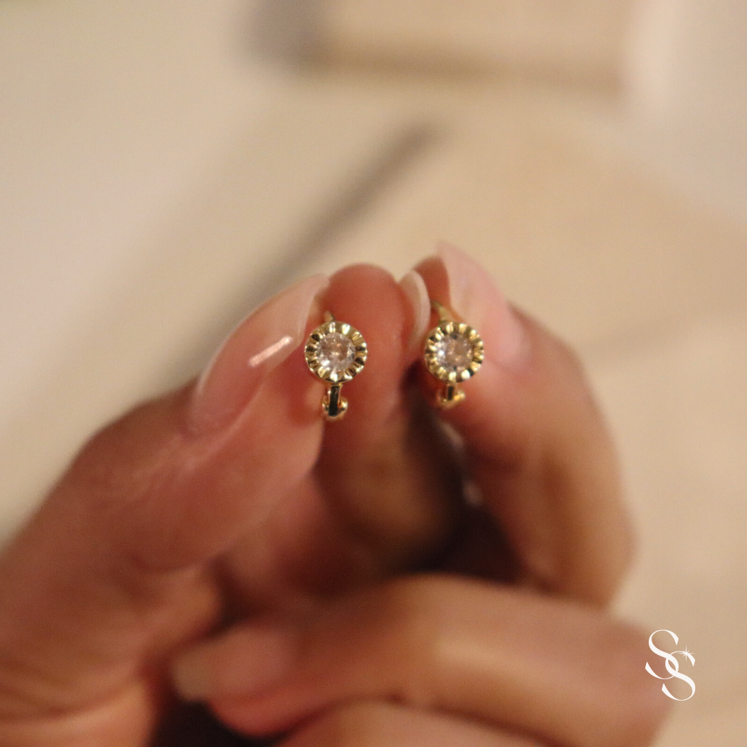 Embrace Huggie Earrings